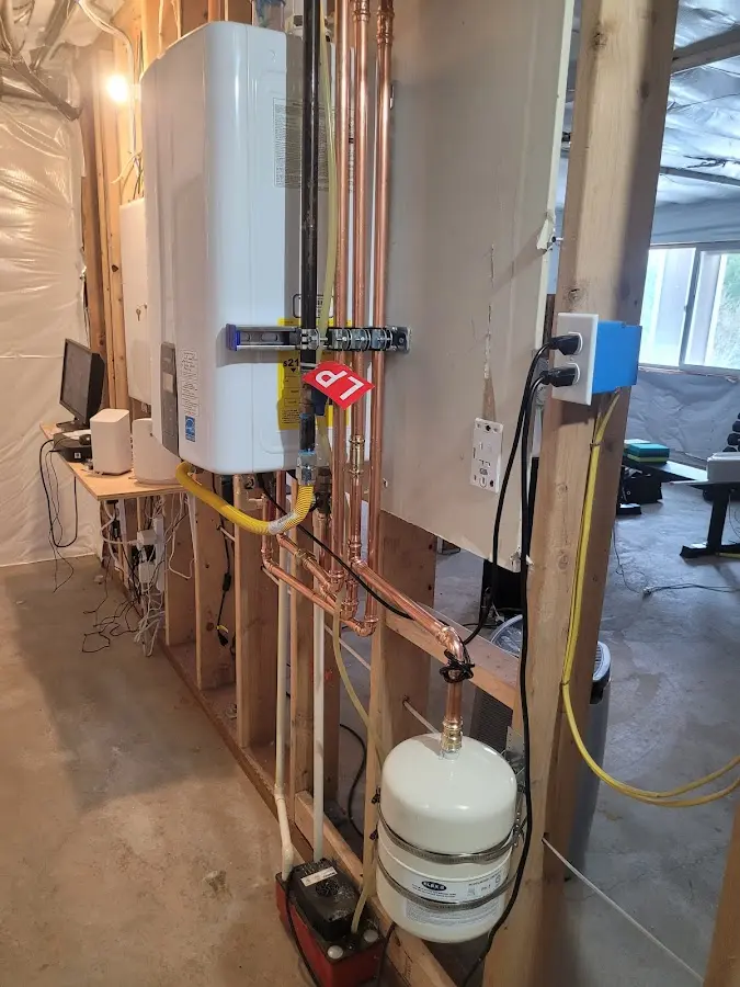 Licensed plumber repairing a kitchen sink in Dalton
